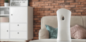 a white device sitting on top of a white table.